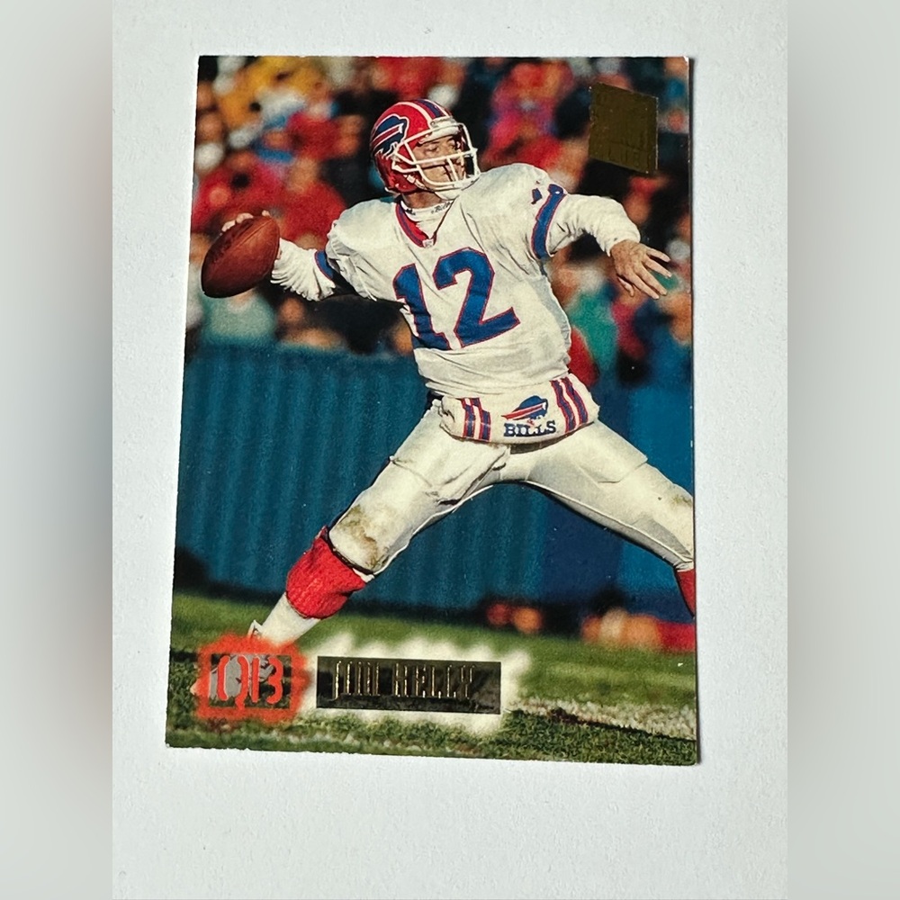 Jim Kelly, Quarterback. Buffalo Bills White Red Blue Football Trading Card